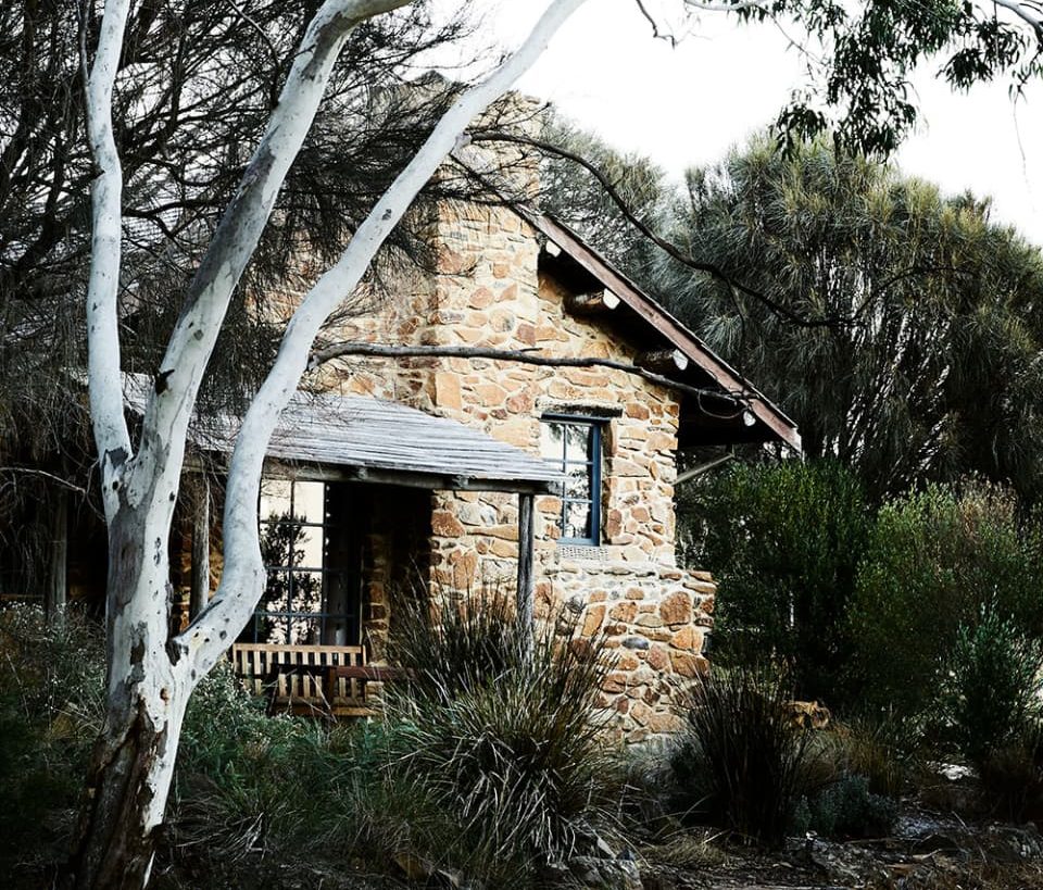 a stone cottage nestled in the gum trees at Piermont